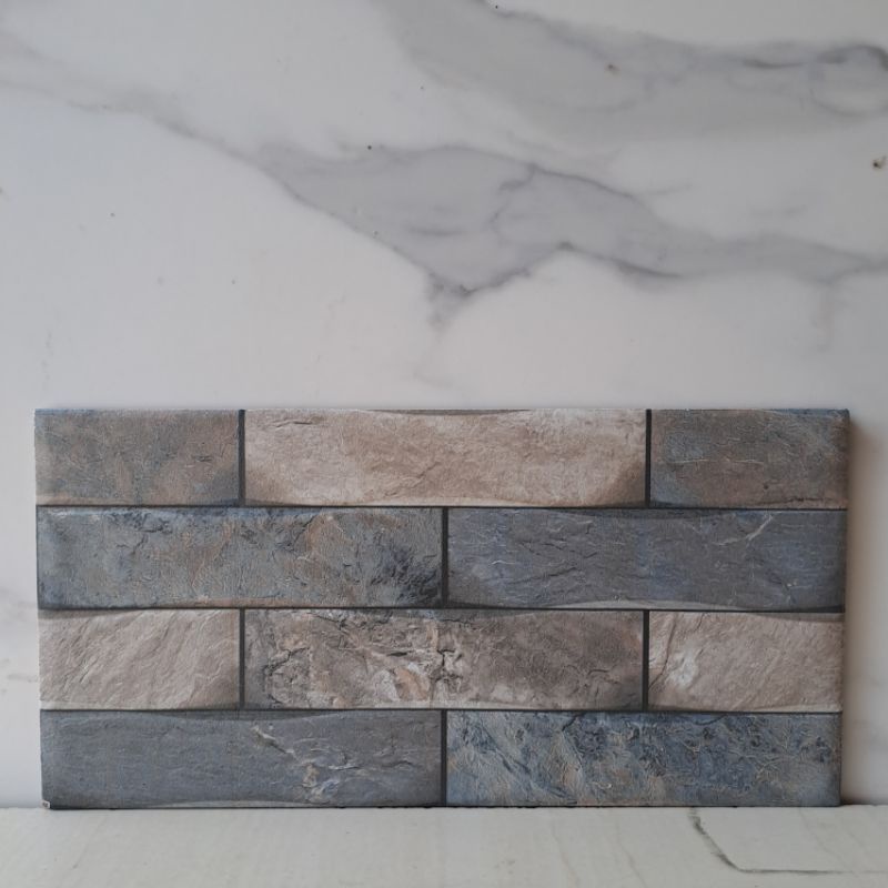 keramik dinding pagar / keramik dinding terace / keramik dinding motif batu alam / keramik dinding m