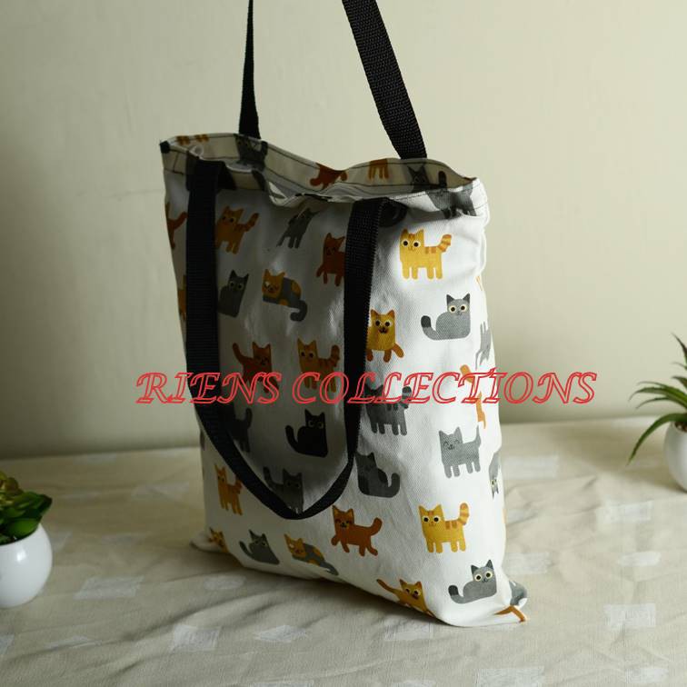 TOTEBAG KANVAS . TAS KANVAS MOTIF KUCING LATAR PUTIH. RIENS COLLECTIONS