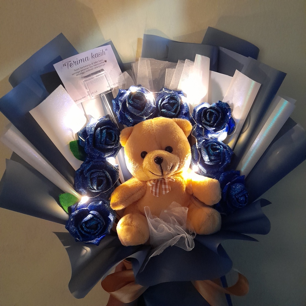 

Buket boneka untuk kado wedding anniv birthday graduation