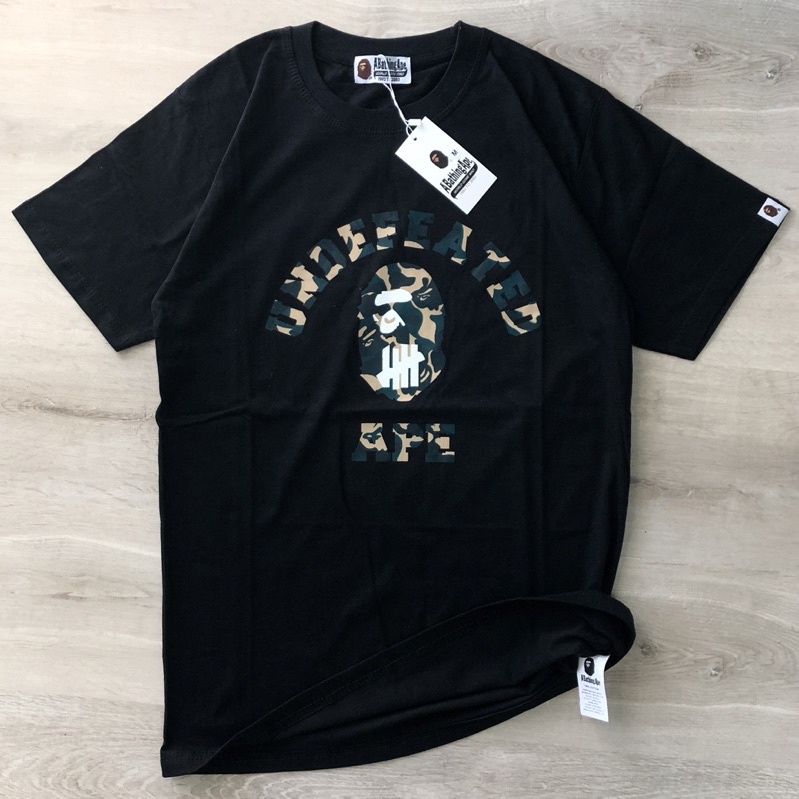 Baju Bape Undefeated Kaos Bape x UND Pria Tshirt Bape Baju A Bathing Ape Logo Camo