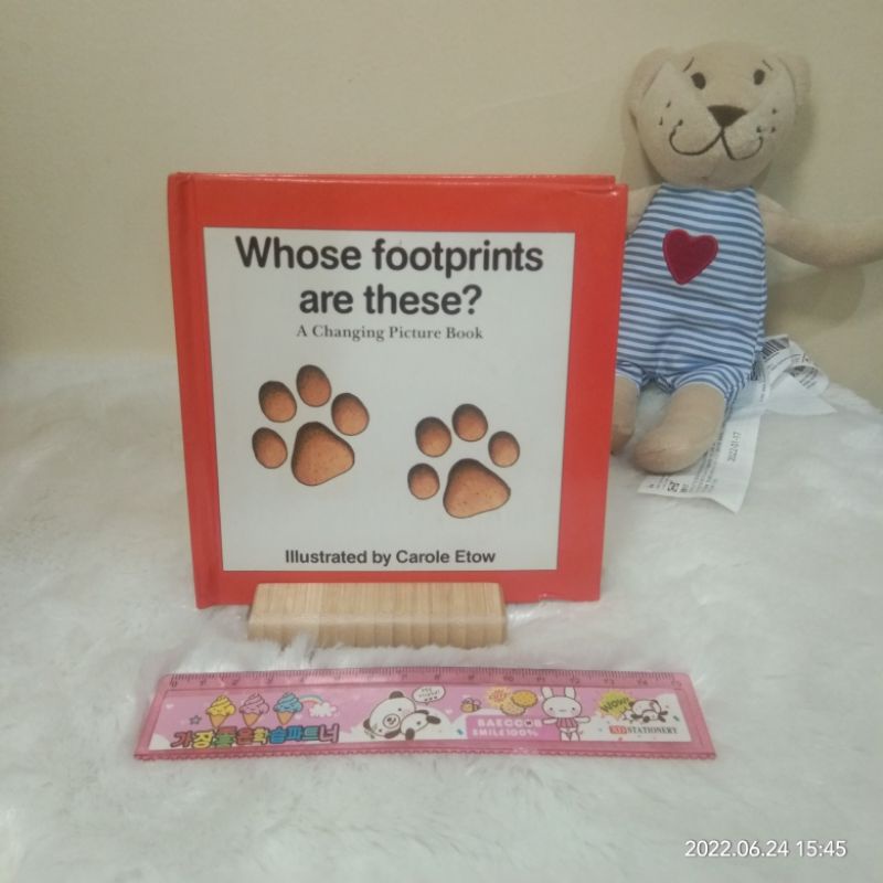 buku anak preloved bekas WHOSE FOOTPRINTS ARE THESE? A Changing Picture Book illustrated by Carole E