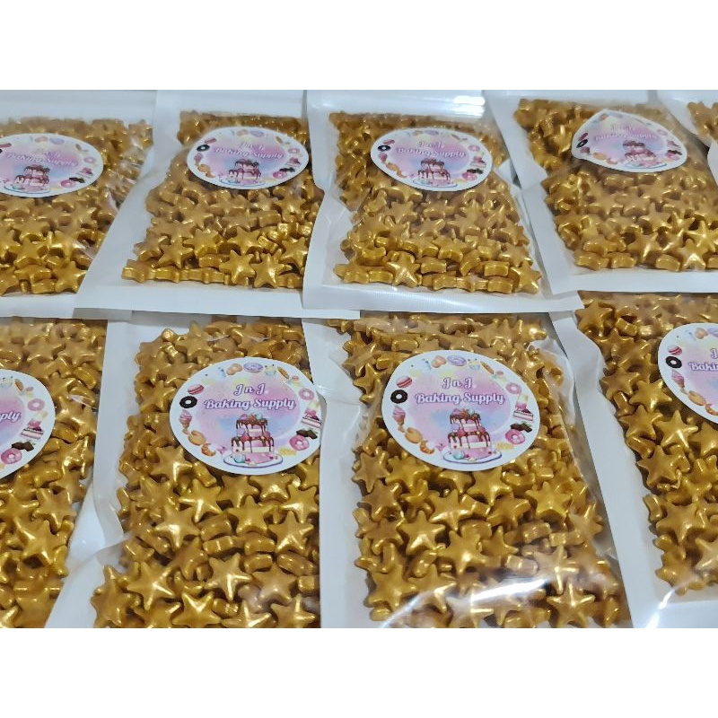 

sprinkle trimit hiasan kue star gold besar 50gram