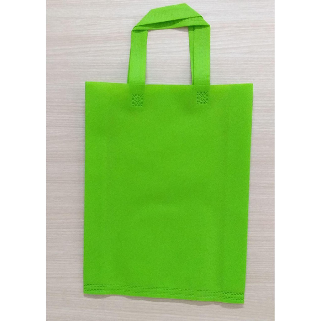 

GOODIE BAG SPUNBOND HANDLE 30x40 (Per Lusin) / Tas Belanja Murah / Kantong Belanja / Souvenir