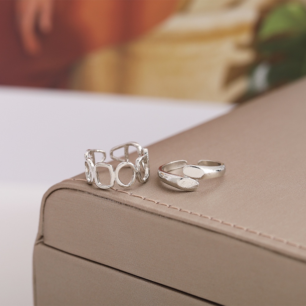 2pcs / Set Cincin Model Terbuka Bahan Metal Desain Geometri Hollow Warna Silver Gaya Simple / Trendy Adjustable Untuk Wanita