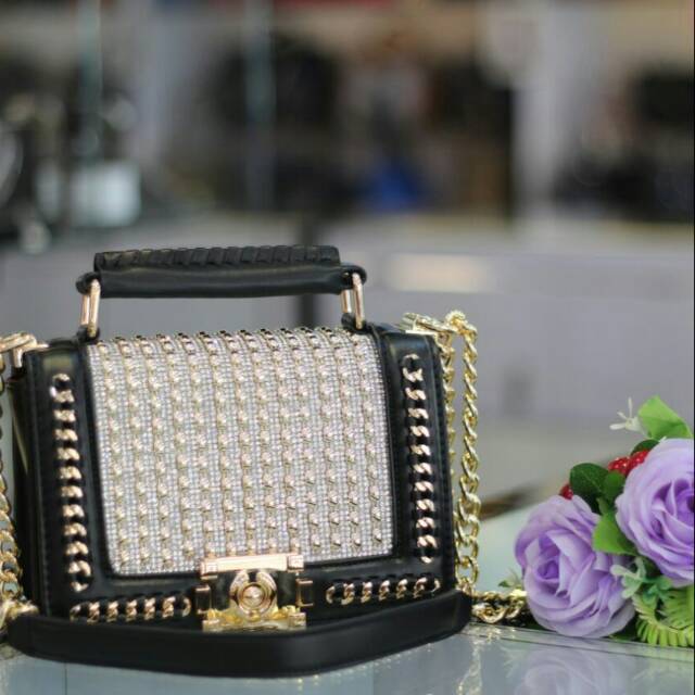 Chanel Boy Glitter Button
Single bag Mini