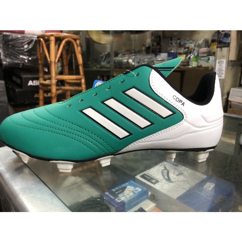 sepatu bola import