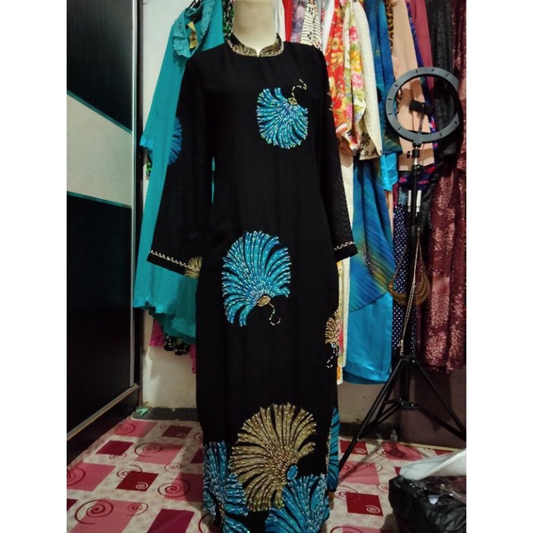 gamis Ceruti motif kipas