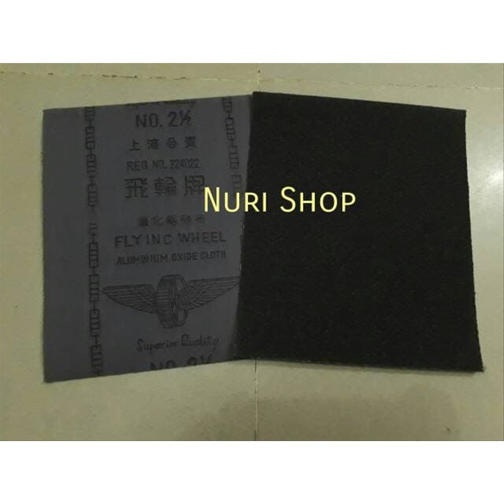 

Kertas Gosok atau Kertas Gosok Kain no. 2 1per2 merk Flying Whee