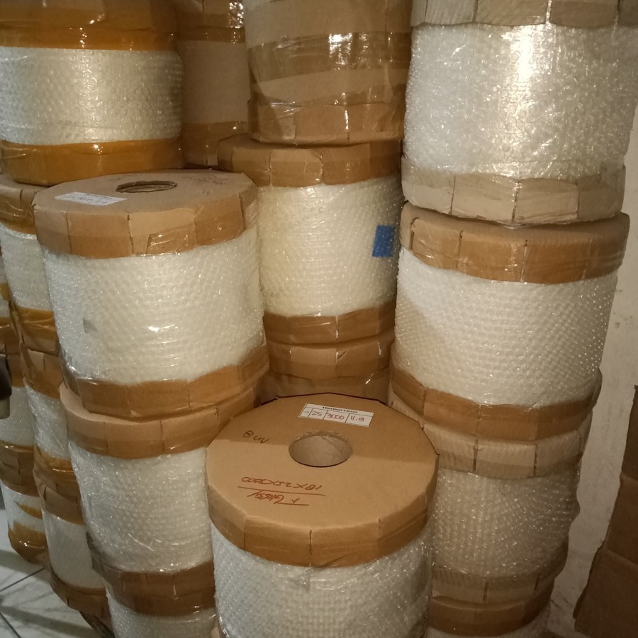 

Plastic Thermal BOPP film UK 33cm tebal 18mic panjang 3000 mtr