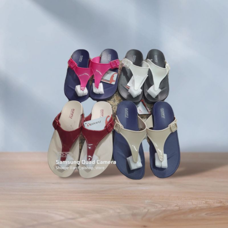 sendal jelly karet import luofu gesper cewek.E 7154