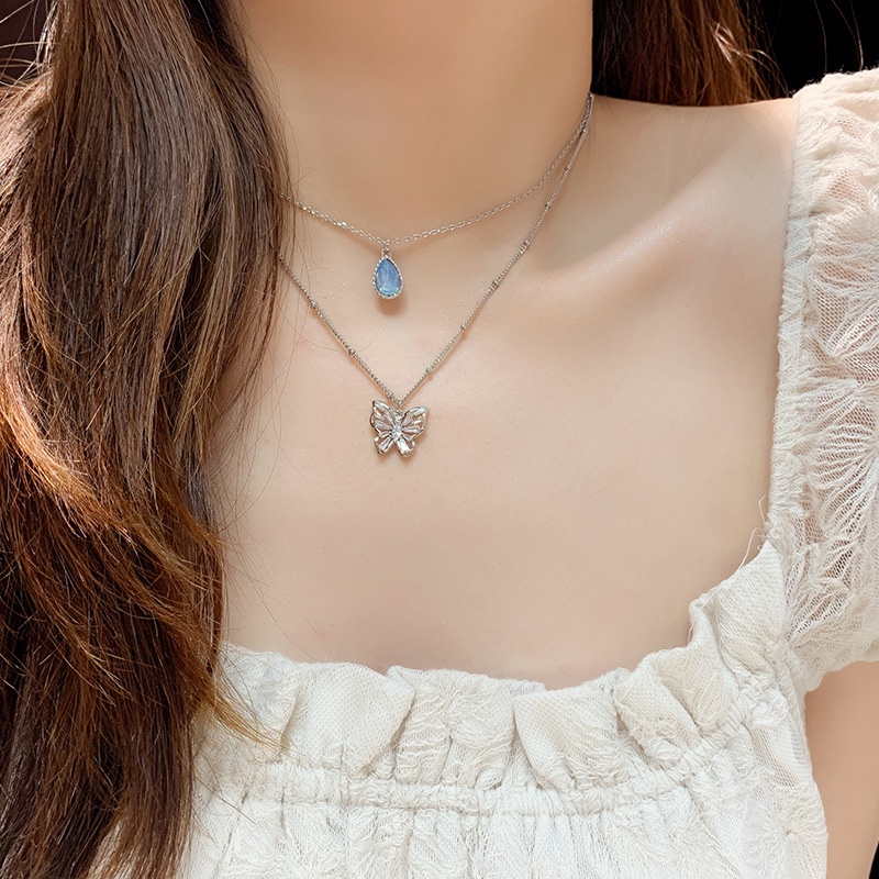 Blue water drop Butterfly zircon elegan retro minoritas sederhana halus semua yang sesuai dengan ras