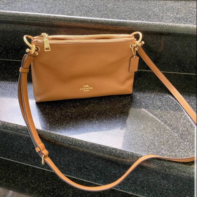 tan wristlet bag