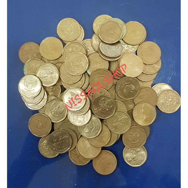 koin 100 rupiah karapan sapi