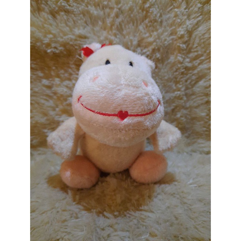 Boneka sapi lucu