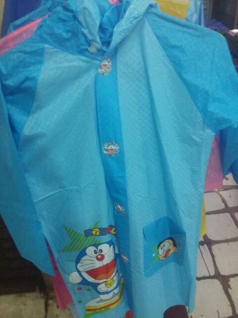 jas hujan anak terusan karakter  doraemon pony h kity frozen lol