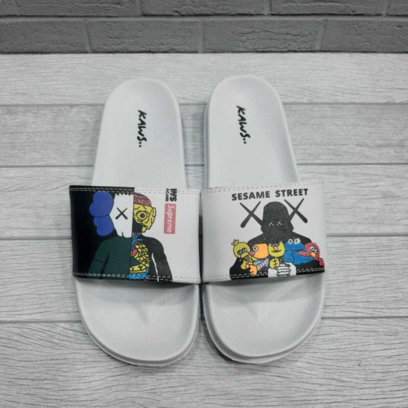 Restock sendal kaws x supreme putih