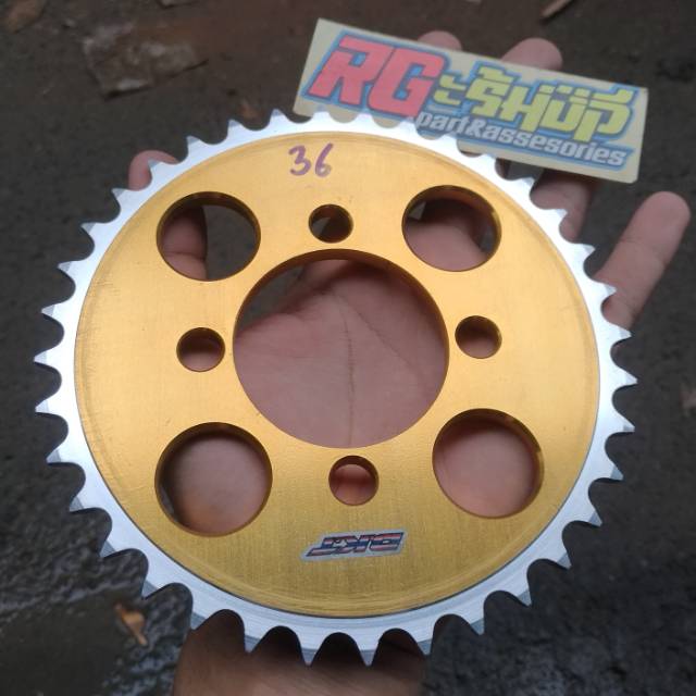 Gear belakang almunium dural sonic 125 old/nova dash gold 415-36T DKT thailand