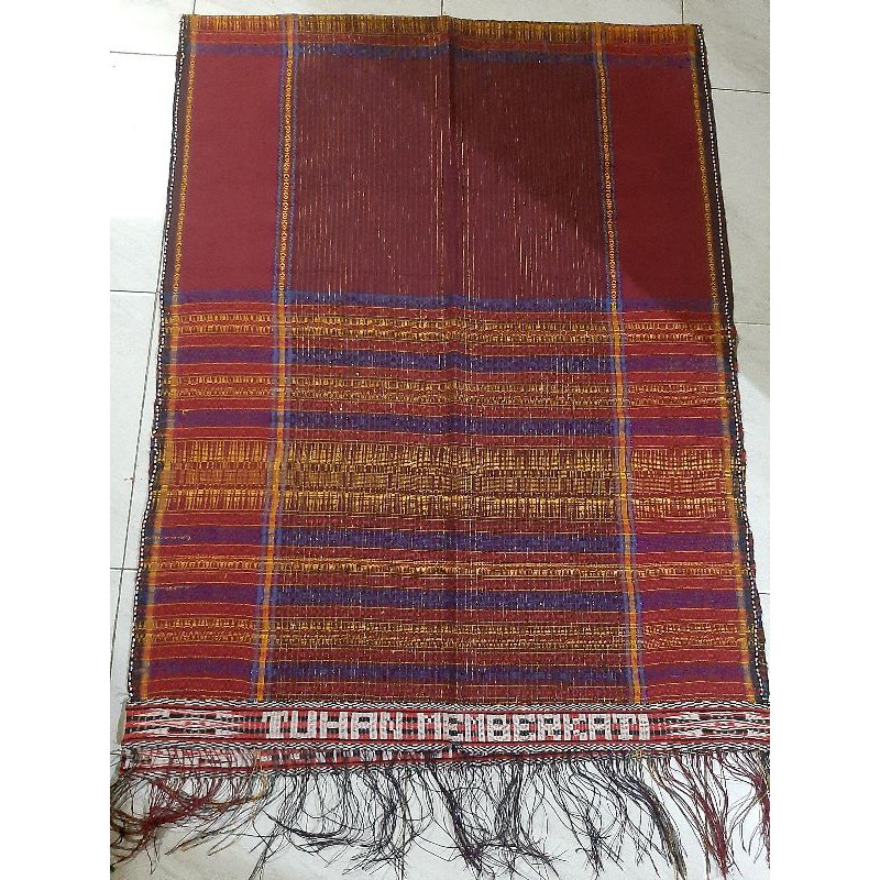 Ulos ragi hotang pakaian adat pria Batak toba