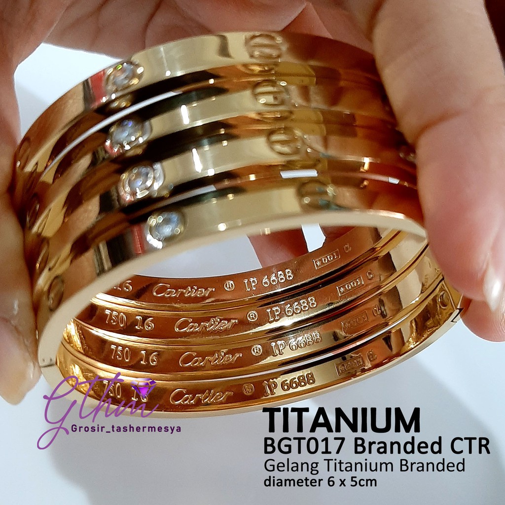 Gelang titanium cap 750 permata bgt077