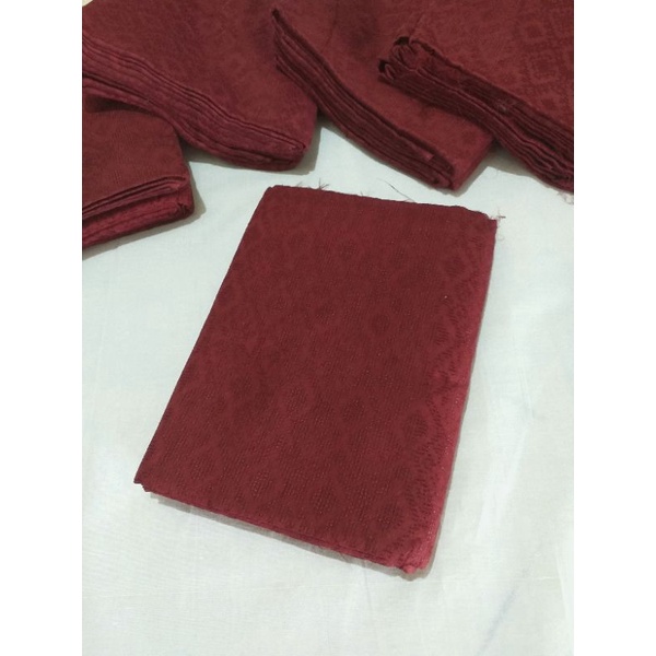 Kain dobby polos warna merah maroon