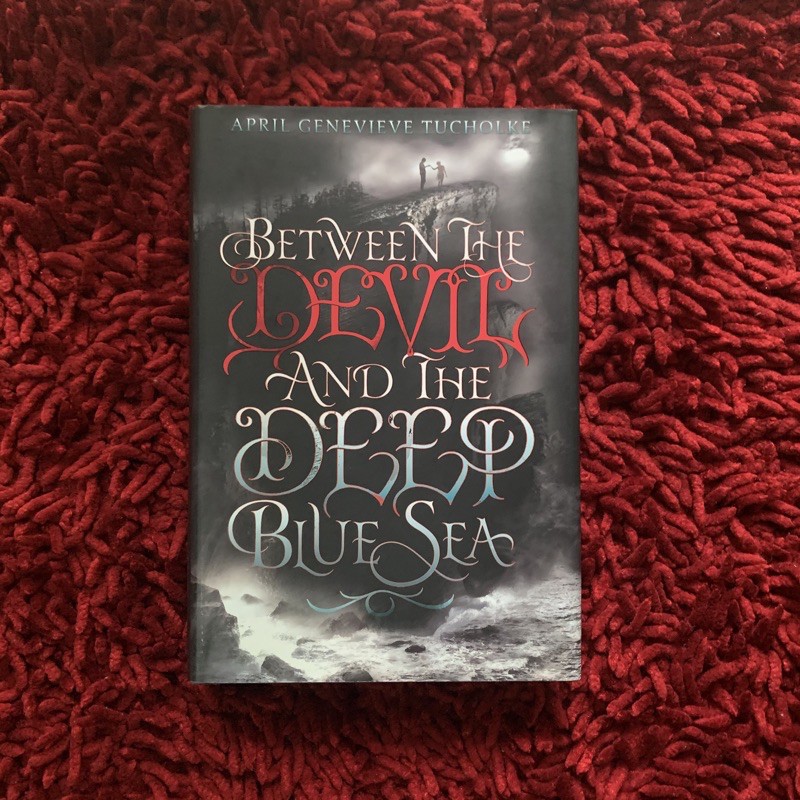 Between The Devil and The Deep Blue Sea by April Genevieve Tucholke (ENG) - Preloved