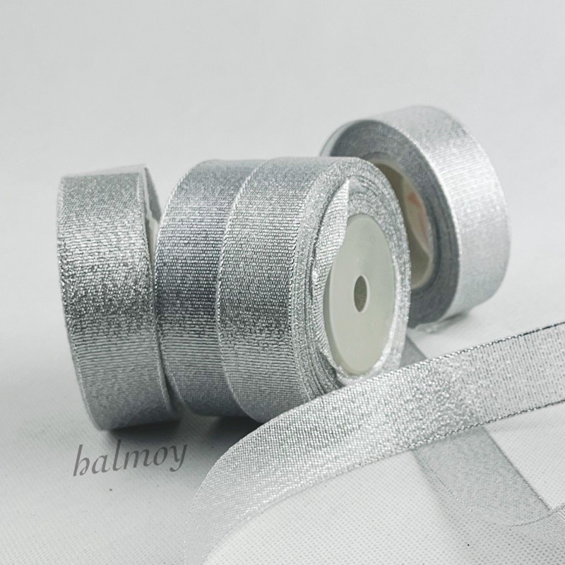 

PITA KAIN GLITTER PERAK SILVER 1 INCI 24 MM 20 YARDS