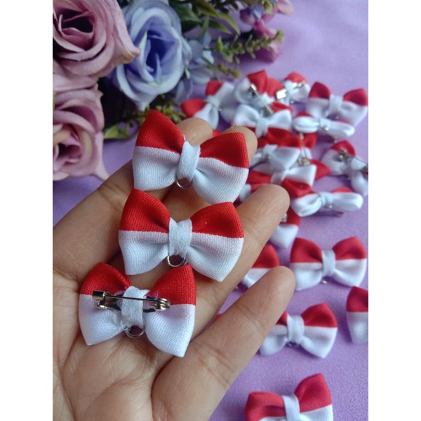 Kepala bross dagu pita merah putih/lusin