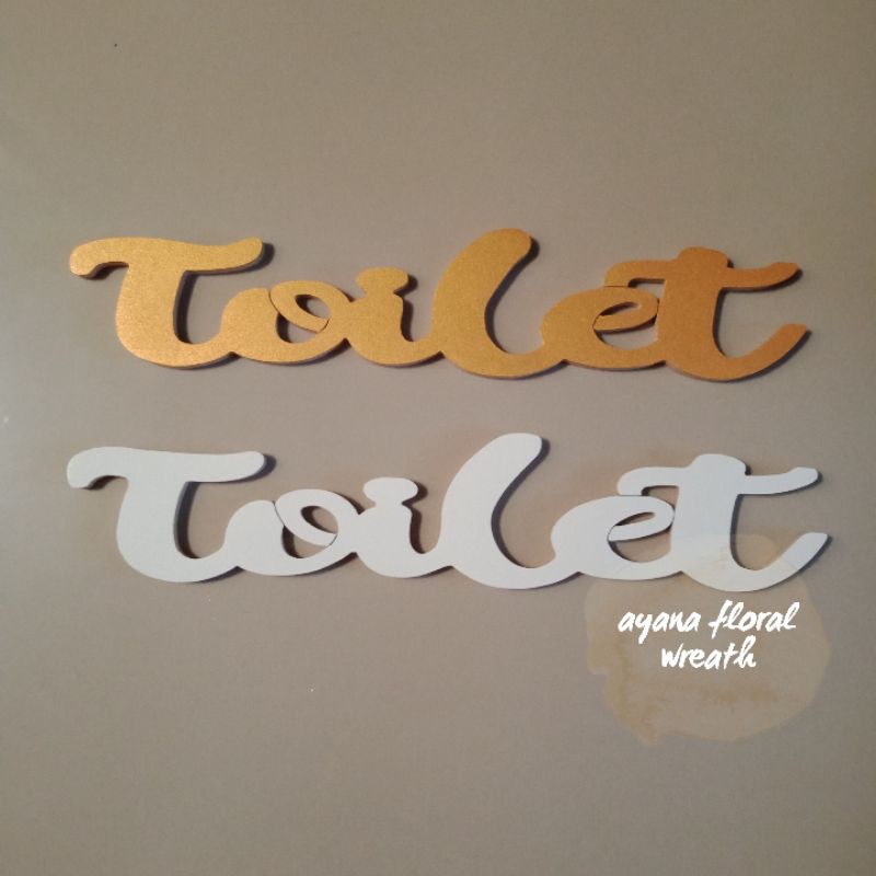 tulisan kayu toilet
