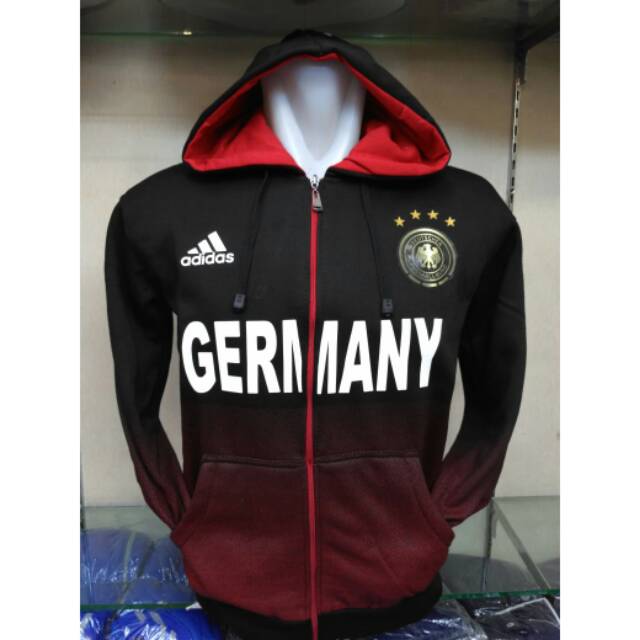 JAKET SWEATER ZIPPER BOLA JERMAN GRADASI HITAM MERAH BS-025