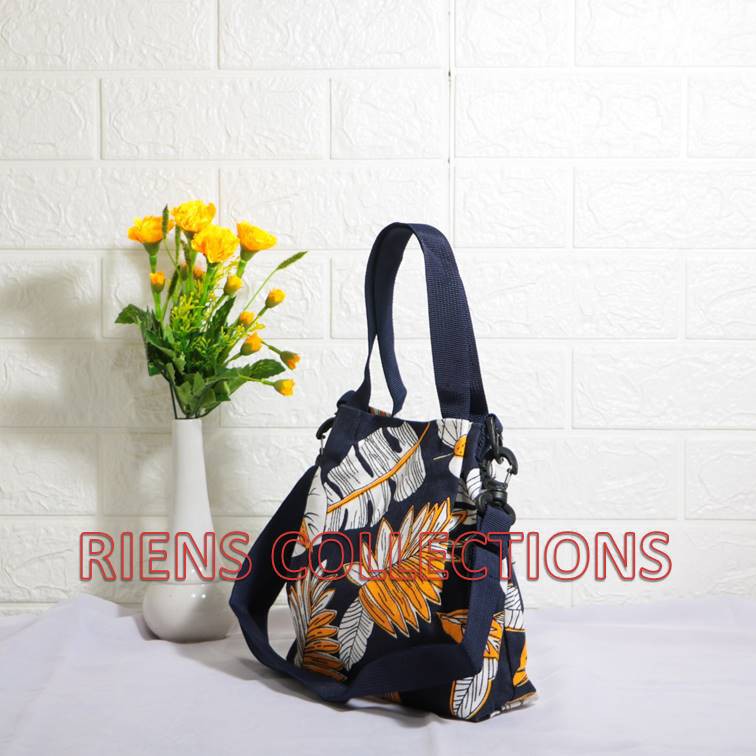 SLING BAG TAS SELEMPANG KANVAS MOTIF ANEKA DAUN BIRU RIENS COLLECTIONS. TAS KANVAS JOGJA