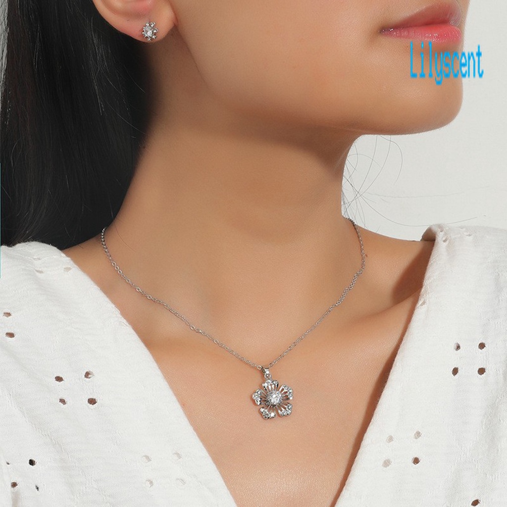 1 Set Kalung Dan Anting Bentuk Kepingan Salju Model Hollow Out Bahan Cubic Zirconia Untuk Wanita