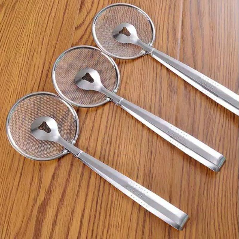 Jepitan Gorengan Dengan Tirisan Minyak