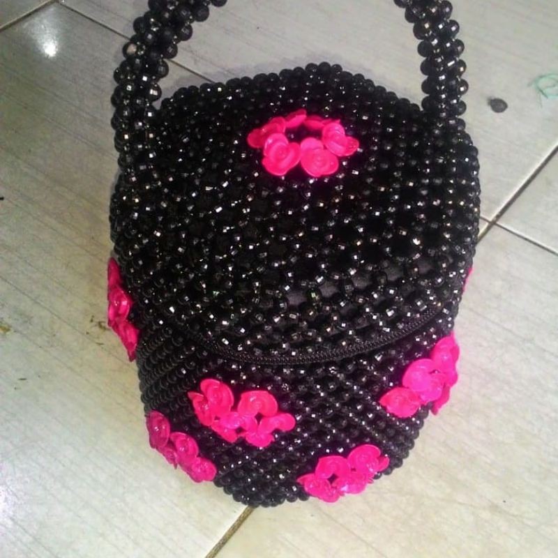 tenong manik hitam pink