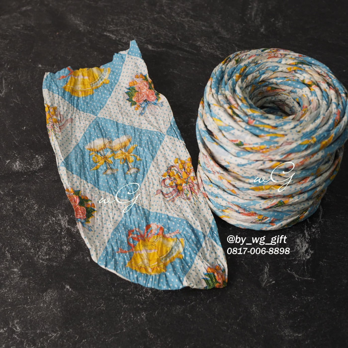 

Pita Tali Kertas - Bunga Biru - Motif 10 ; L 10 cm; P 25 yards