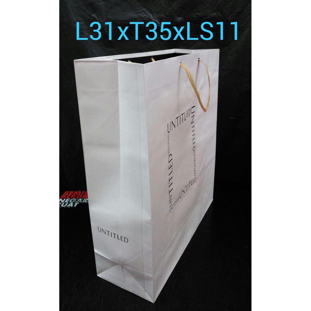 

Paper bag motif label uk 31x35x11