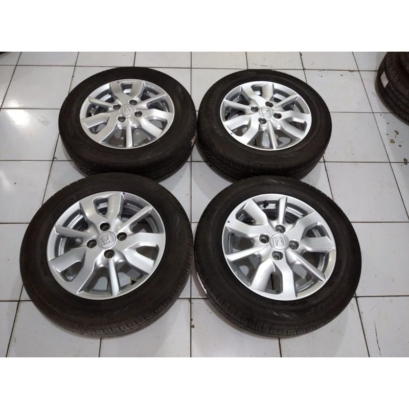 velg mobil second brio r14 plus ban dunlop 175 65 r14 kondisi 80%