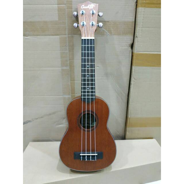 Ukulele Soprano Merk Cowboy Original Tipe UK-21 NS Coklat Tua Ukiran Jakarta Bonus Tas Senar Pick