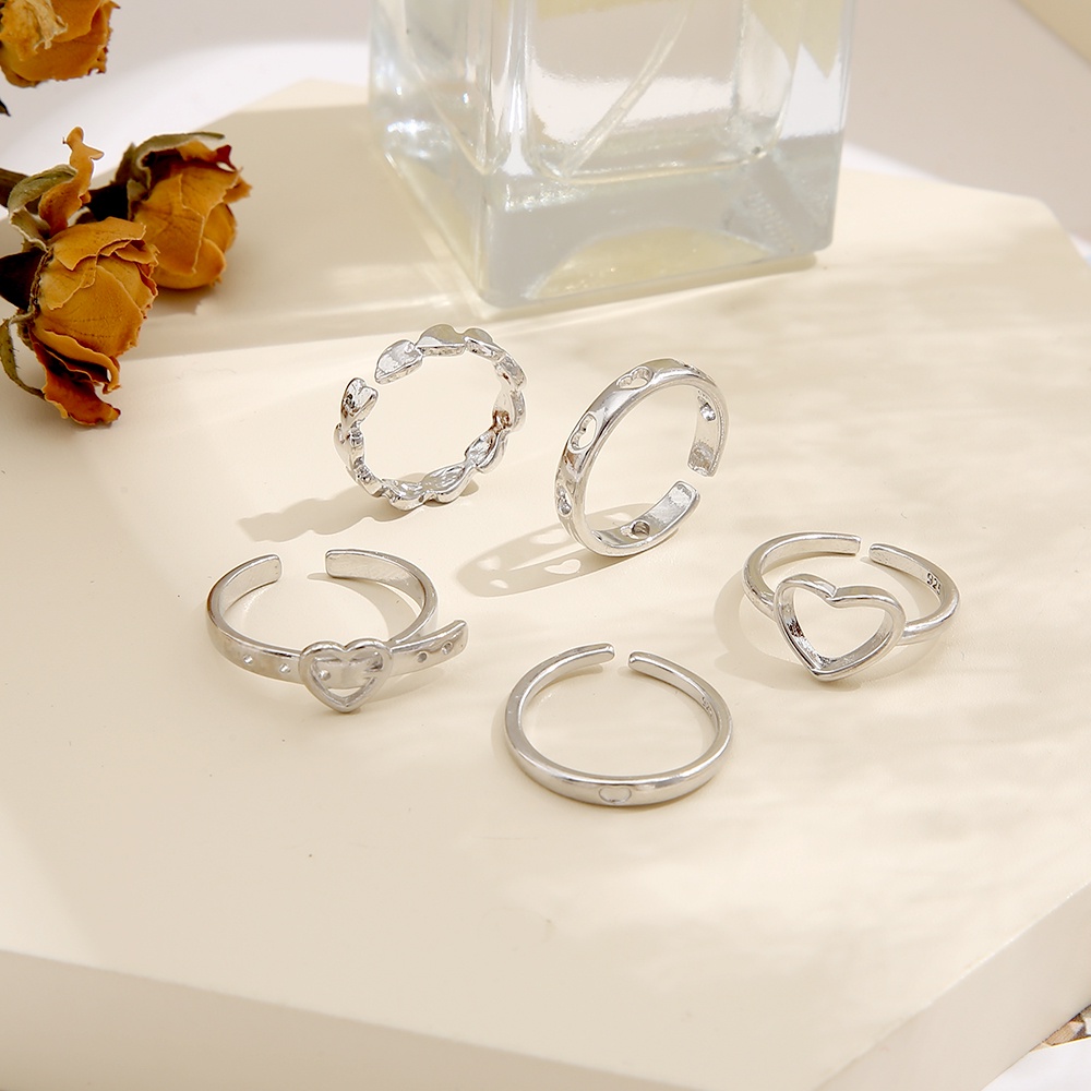 YEEZII 5pcs / Set Cincin Model Terbuka Adjustable Desain Hati Hollow Warna Silver Untuk Wanita