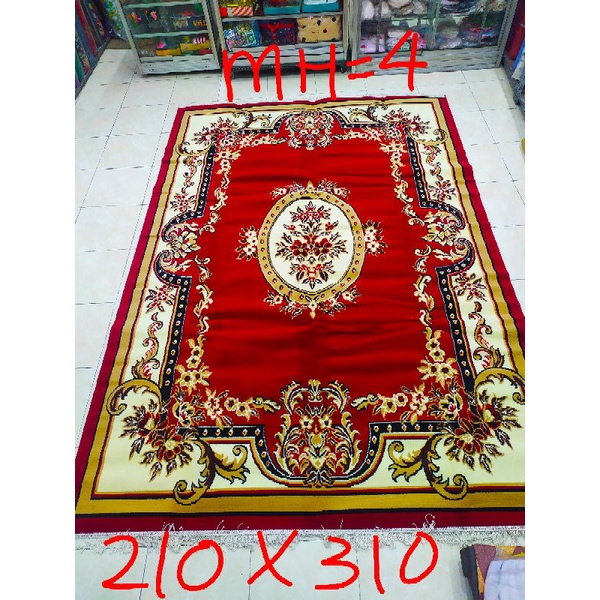 Karpet permadani motif kembang merah