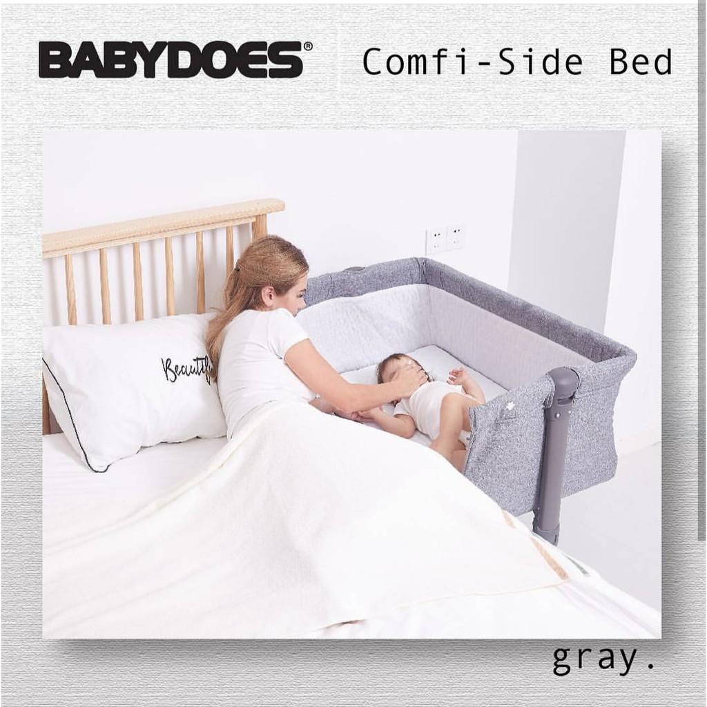 baby bed on side of bed