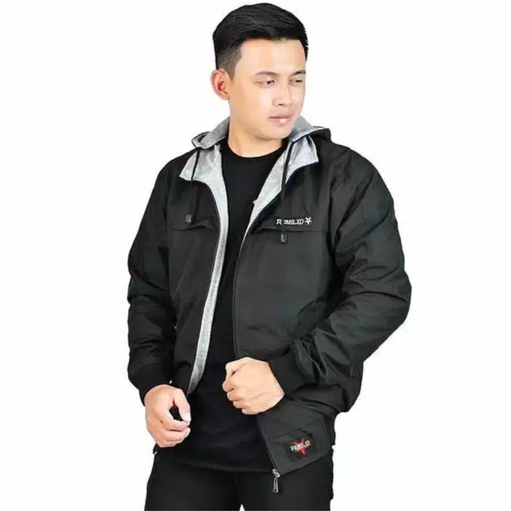 JAKET TASLAN PRIA WATERPROOF HOODIE BISA DI LEPAS REBEL ID ORIGINAL