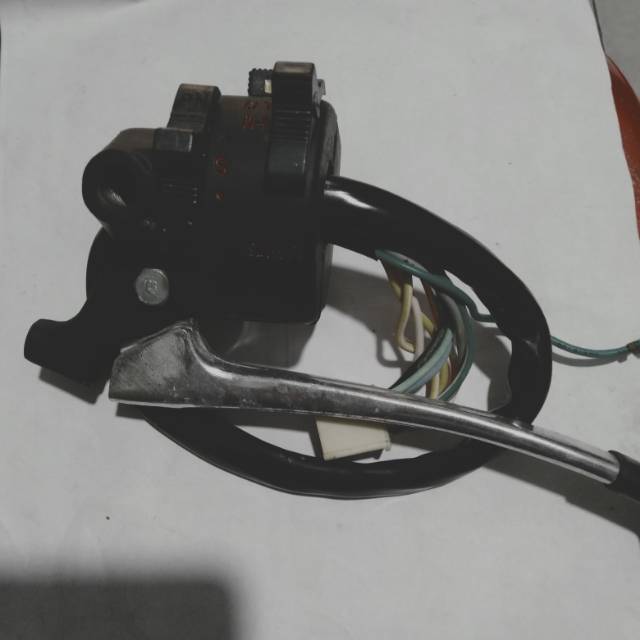 Saklar holder kiri Suzuki GP100 TRS