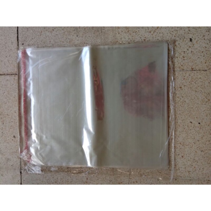 

PLASTIK OPP 35X40CM X TEBAL 03 - PLASTIK BAJU - KANTONG KEMASAN BENING - KEMASAN BAJU ADA LEM