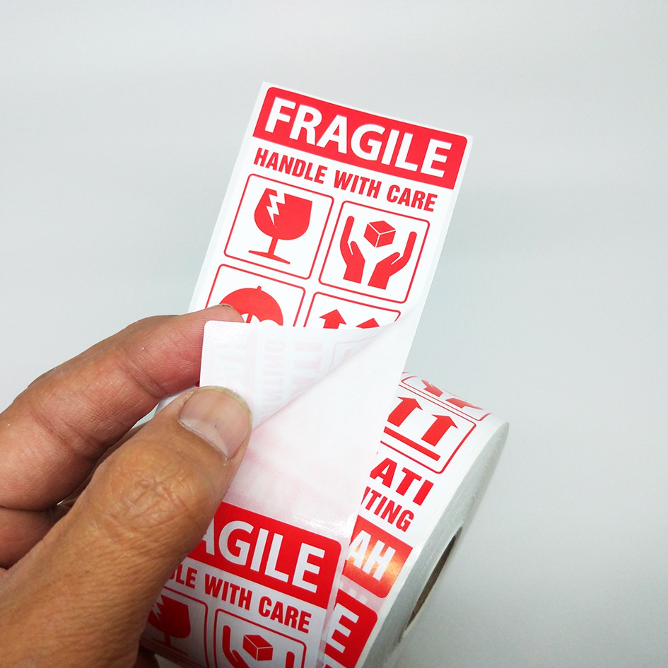

MilL Stiker Label Fragile Handle With Care Sticker Hati-Hati Awas Pecah 9.5 x 5 Cm (1 Roll/ 500 pcs)
