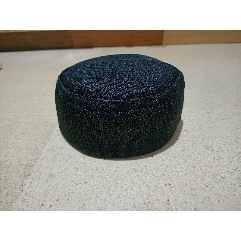 peci kopiah jaring taliban