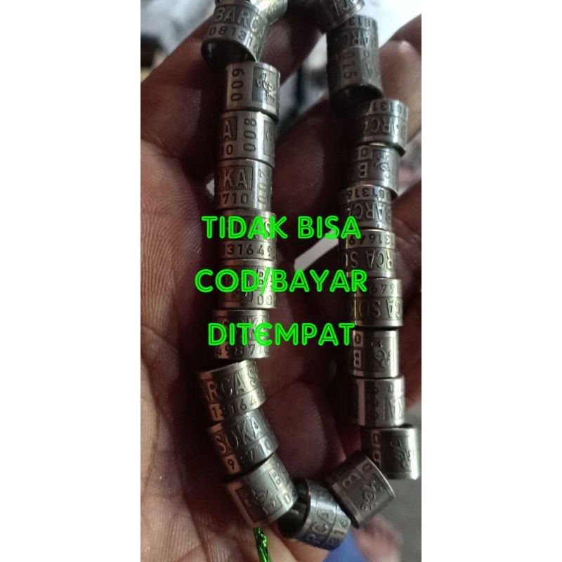 Ring merpati baja timbul