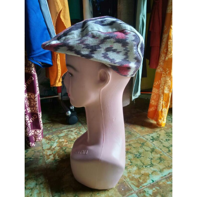 topi pet tenun