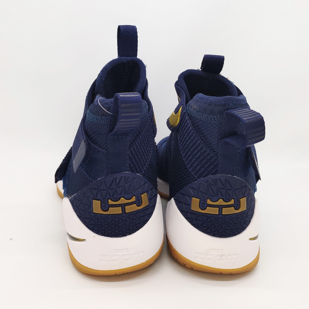 white lebrons with strap