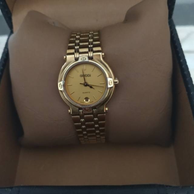 gucci watch 9200l gold