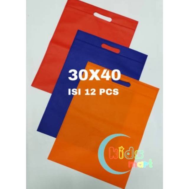 

Tas spunbond oval 30x40cm/tas souvernir goodie bag